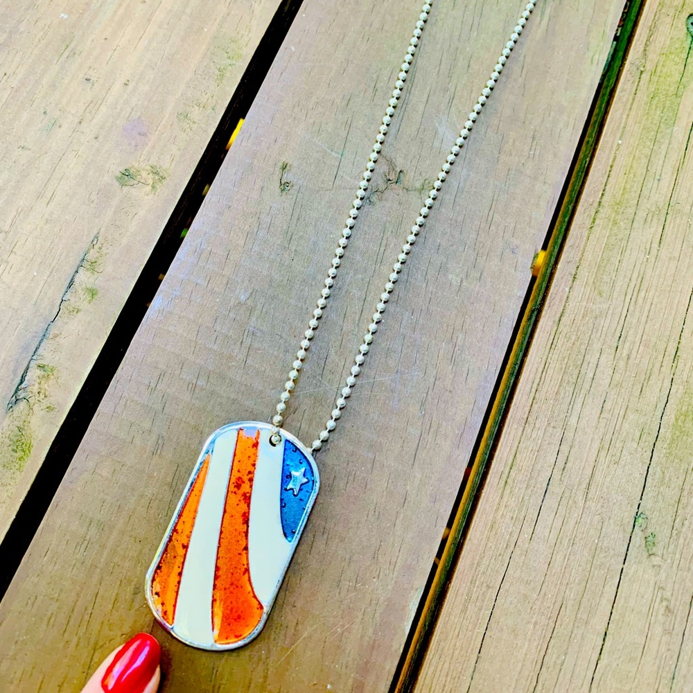 Dog tag style metal necklace with American flag pendant tag